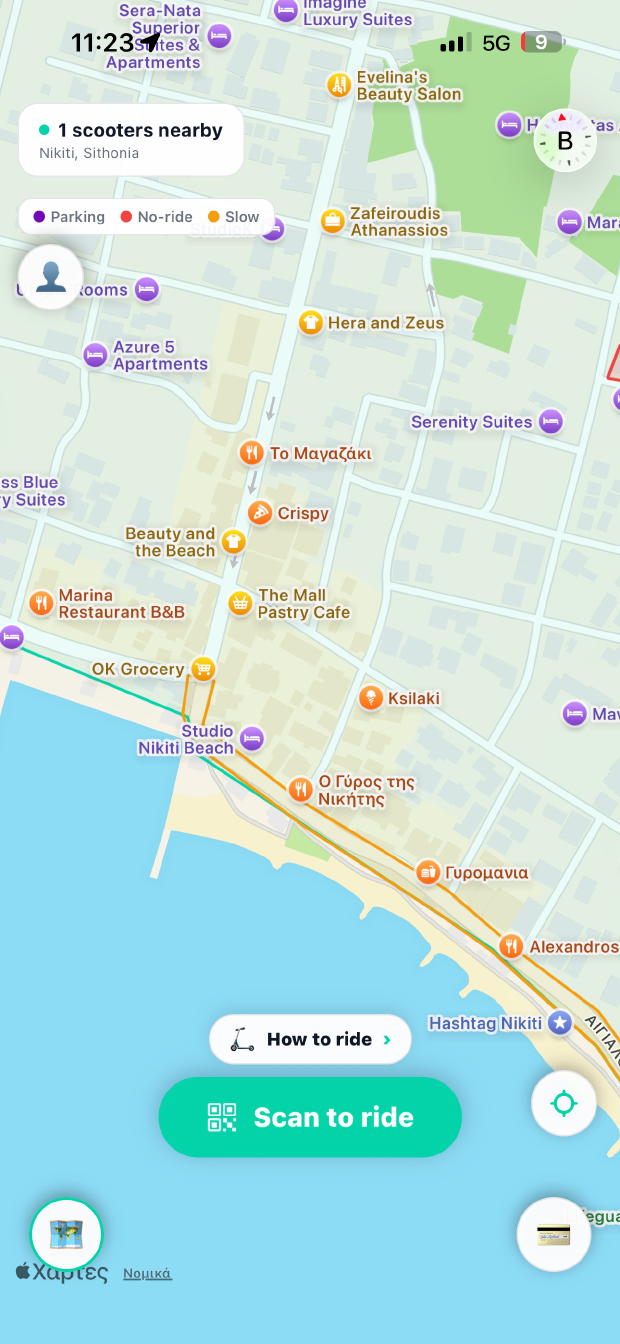The Scootie app showing scooters on a map of Nikiti, with a Scan to ride button